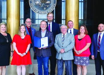 Group of people smiling.