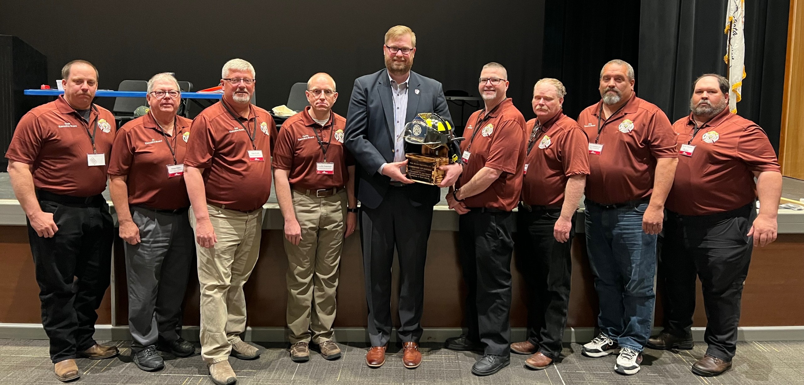 Commissioner Jon Godfread pictures with members of the NDFA Executive Board