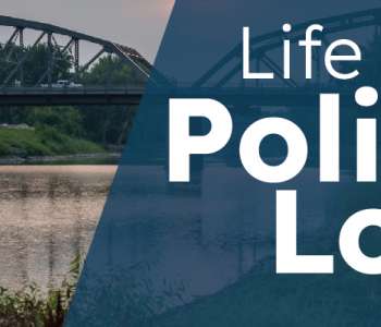 Life Insurance Policy Locator above picture of a river and bridge.